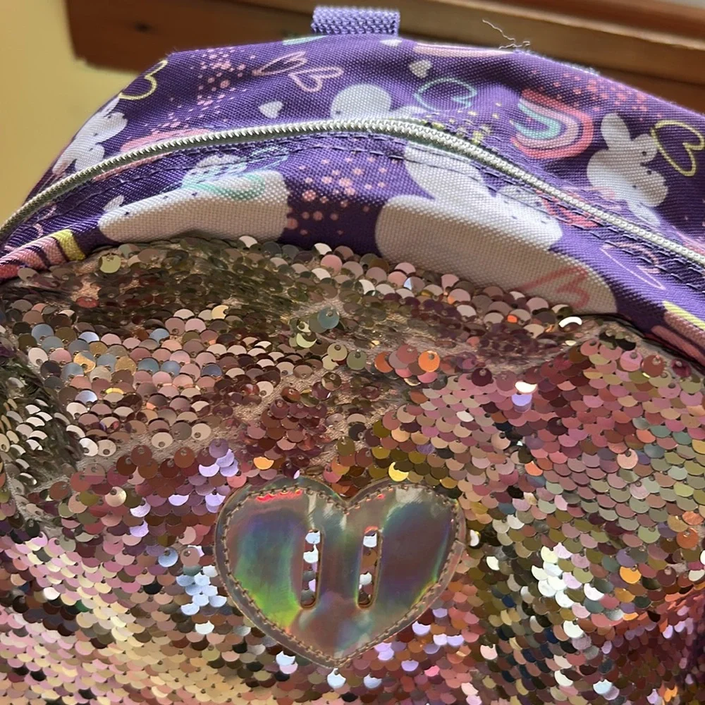 Purple rainbows and sparkles backpack